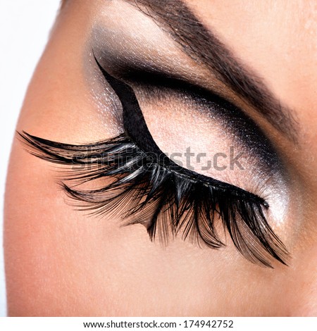 Beautiful Eye Makeup with long false eyelashes. Holiday visage