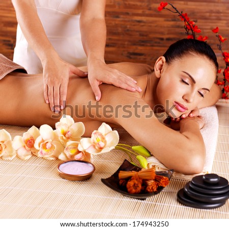Masseur Doing Massage On Woman Body In The Spa Salon. Beauty Treatment Concept.