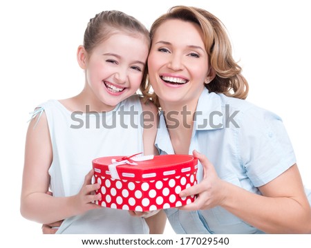 Portrait of happy  white mother and young daughter hold present - isolated. Happy family people concept.