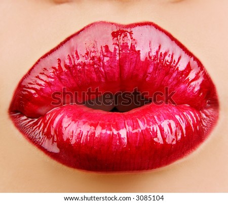 stock photo : Glamour Red gloss lips with kissing gesture.