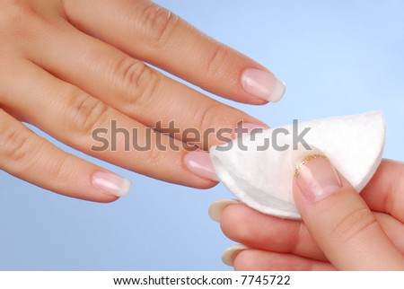 Nail beauty. Cleaning woman nails.