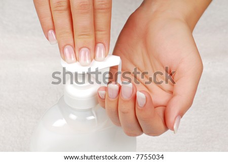 Hygiene skin - Human press the liquid soap on hands.