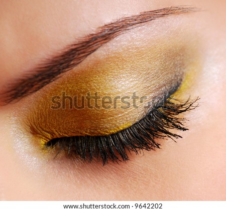 Красив грим Stock-photo-fashion-make-up-bright-yellow-eyeshadow-on-eyes-closed-9642202