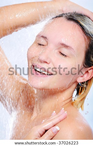 stock photo beautiful cheerful happy naked girl taking shower 37026223