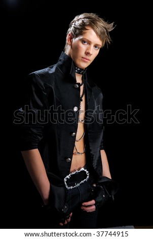 stock photo : Young man with creativity stylish hairstyle in the hard-rock 