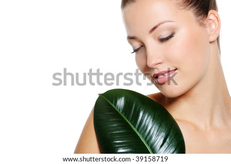 stock photo Beautiful candid woman face with closed eyes and green fresh