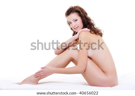 stock photo Beautiful caucasian woman with a perfect nude body sitting on