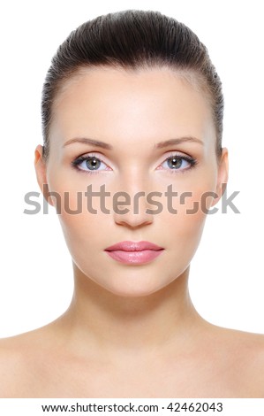 Close-Up Front View Portrait Of A Beauty Young Female Face Over White