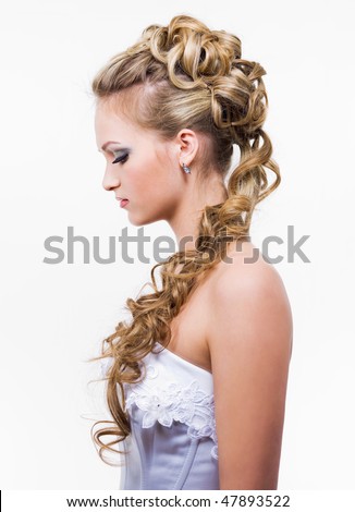 stock photo Young bride with beauty wedding hairstyle profile isolated 