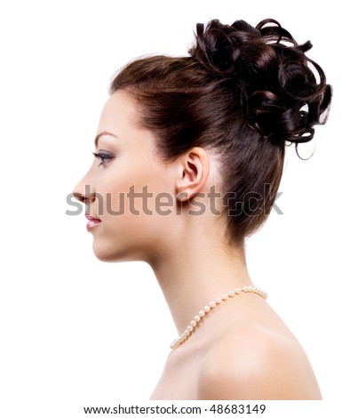 stock photo Profile portrait of an young bride with wedding hairstyle on 