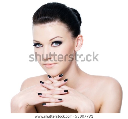 stock photo : Beautiful female face with fashion eye make-up and black 