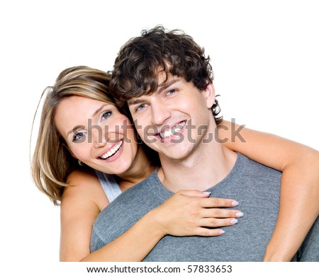stock photo : Portrait of a beautiful young happy smiling couple - isolated