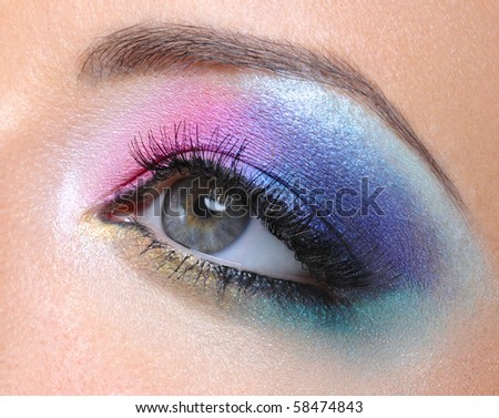 Beautiful bright fashion makeup of female eye - macro shot