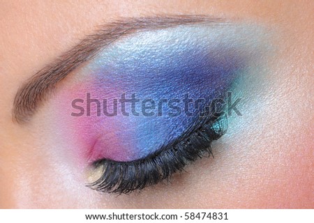 Beautiful bright fashion makeup of female eye - macro shot