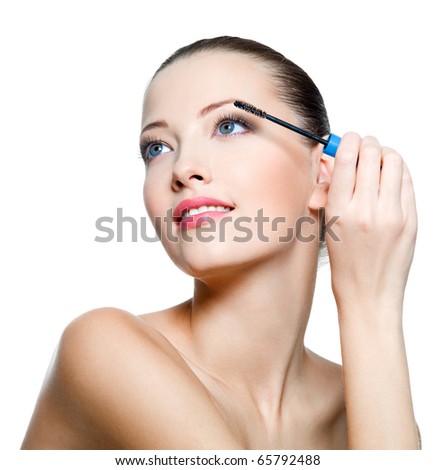 Lifestyle - Pagina 3 Stock-photo-beautiful-young-adult-woman-applying-mascara-on-eyelashes-isolated-on-white-65792488