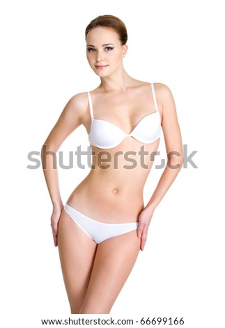 stock photo Beautiful female body in white underwear isolated on white