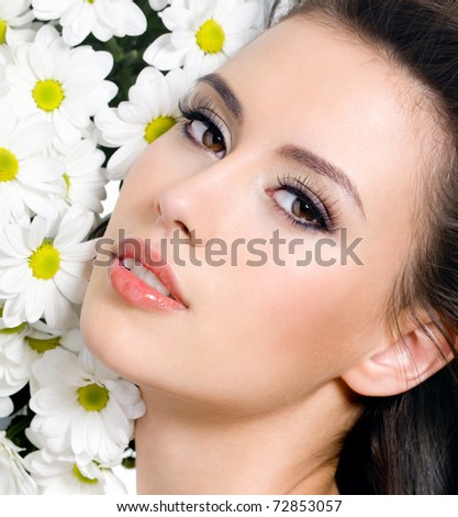 stock photo Beautiful and sexy face of woman with flowers