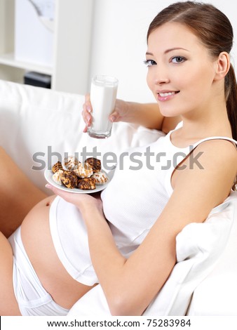 pregnant woman eating. pregnant woman eating