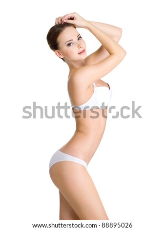 stock photo Beautiful female body in white underwear isolated on white 