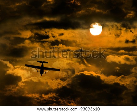 airplane/I believe I can fly/small airplane at sunset sky
