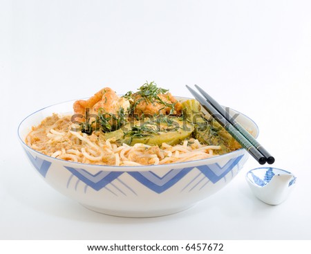 Still life of a bowl of laksa, a traditional South East Asia dish, created from the fusion of Chinese and Malay food cultures.