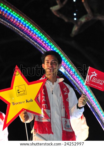 SINGAPORE - JAN 30: Terence Koh, a national sports sailor, on a motorized float platform, at the Chingay Parade on Jan 30, 2009, held in the city district of Singapore.