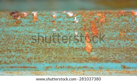 Rusty Colored Metal with cracked paint, grunge background