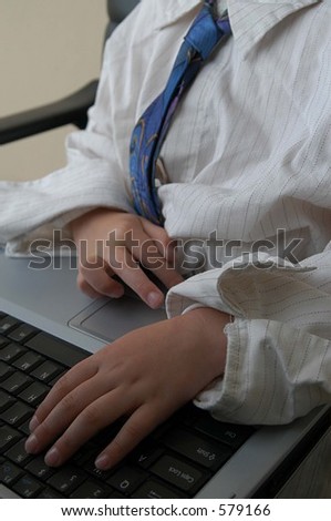 young business man typing on lap top computer