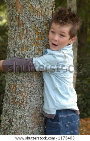 Boy Hugging Tree