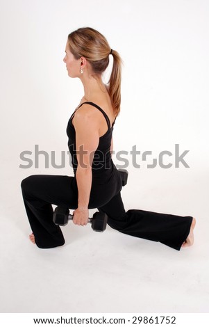 female fitness model doing lunge exercises