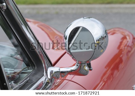 red car with mirror chromed
