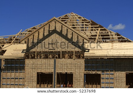 Wooden roof frame of a house under construction