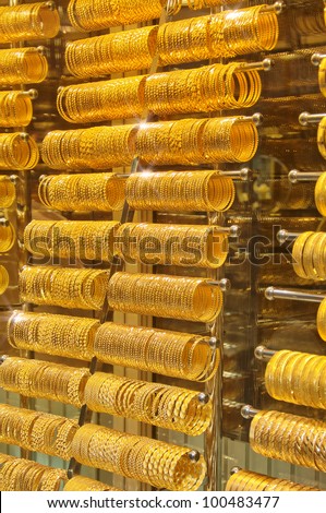 Gold bracelets on display at an indoor market in Istanbul, Turkey.
