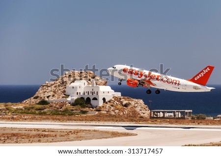 SANTORINI, GREECE - July 10, 2011: easy jet low cost airline, Airbus A320 aircraft departing from International Airport \'Santorini\', Greece.