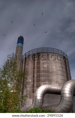 An HDR image of an industrial complex in a derelict area of the city.