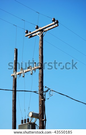 Telegraph poles carrying power and communication to the people of crete in Greece.