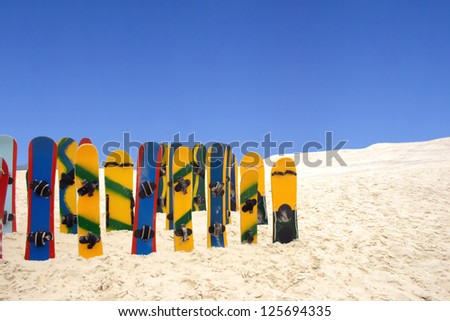 Colorful Sand boards at Joaquina Beach in Florianopolis, Santa Catarina, Brazil.