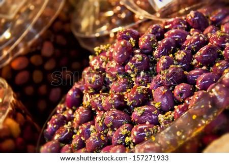 Spiced olives for sale at grocery store