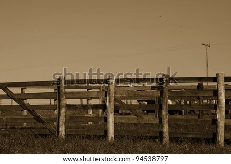 Farm fence - Sepia Toned a great image for your job.