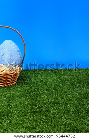 Easter theme: Blue Easter eggs hunt from side