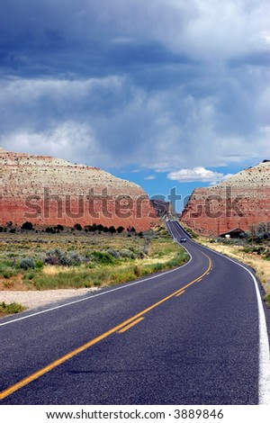Winding road running through the southwestern desert landscape.