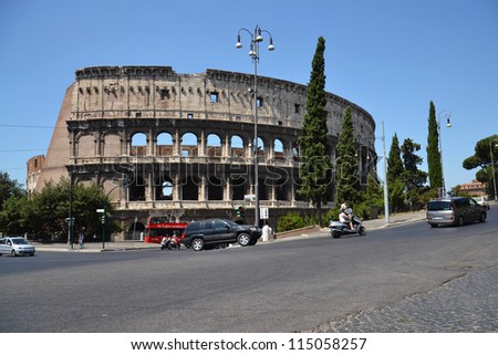 ROME, ITALY - JULY 10: Cars in front of Colosseum on July 10, 2012 in Rome, Italy. Experts say ancient building has started to tilt, with south side 40cm lower than north, and may need urgent repairs.