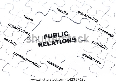 Public relations white puzzle pieces assembled