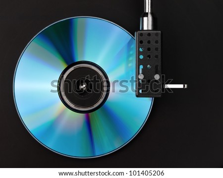 Player of vinyl disks and compact disk.