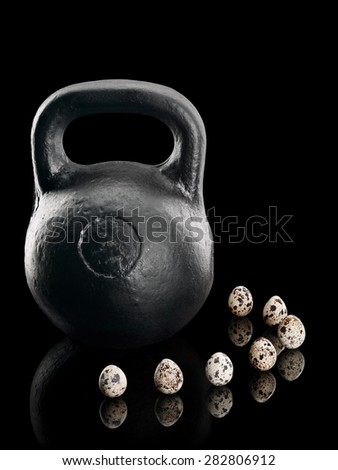 The pig-iron weight and seven quail eggs