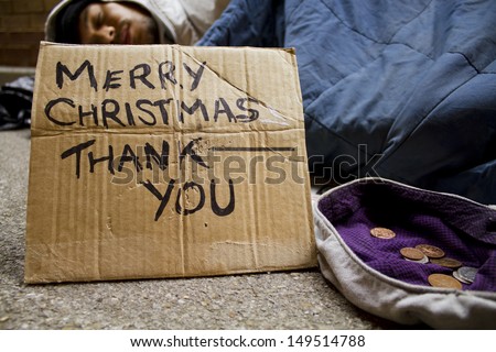 Homeless Man Sleeping Rough at Christmas. Social issues