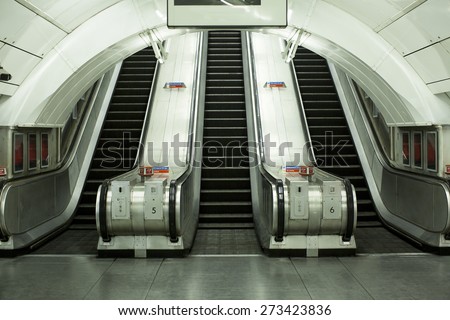 Viewpoint of the base of escalators at a public transportation station