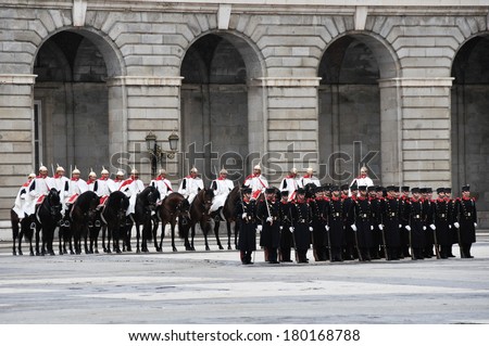MADRID, SPAIN - FEBRUARY 12: Royal Guards participate in the Changing of the Guard at Royal Palace on february 12, 2014 in Madrid, Spain.
