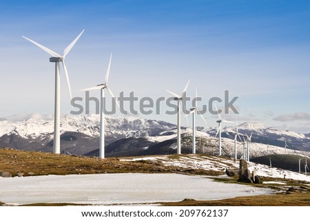 Wind turbines farm in winter, Basque Country, Spain