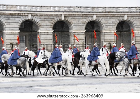MADRID, SPAIN - FEB 12: Royal Guards participate in the Changing of the Guard at Royal Palace the first Wednesday of each month on february 12, 2014 in Madrid, Spain.